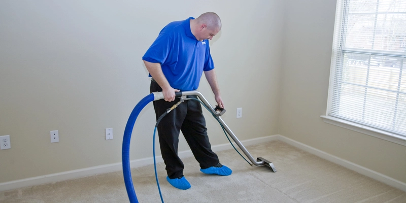 man carpet cleaning