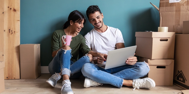 couple talking about finance after moving in